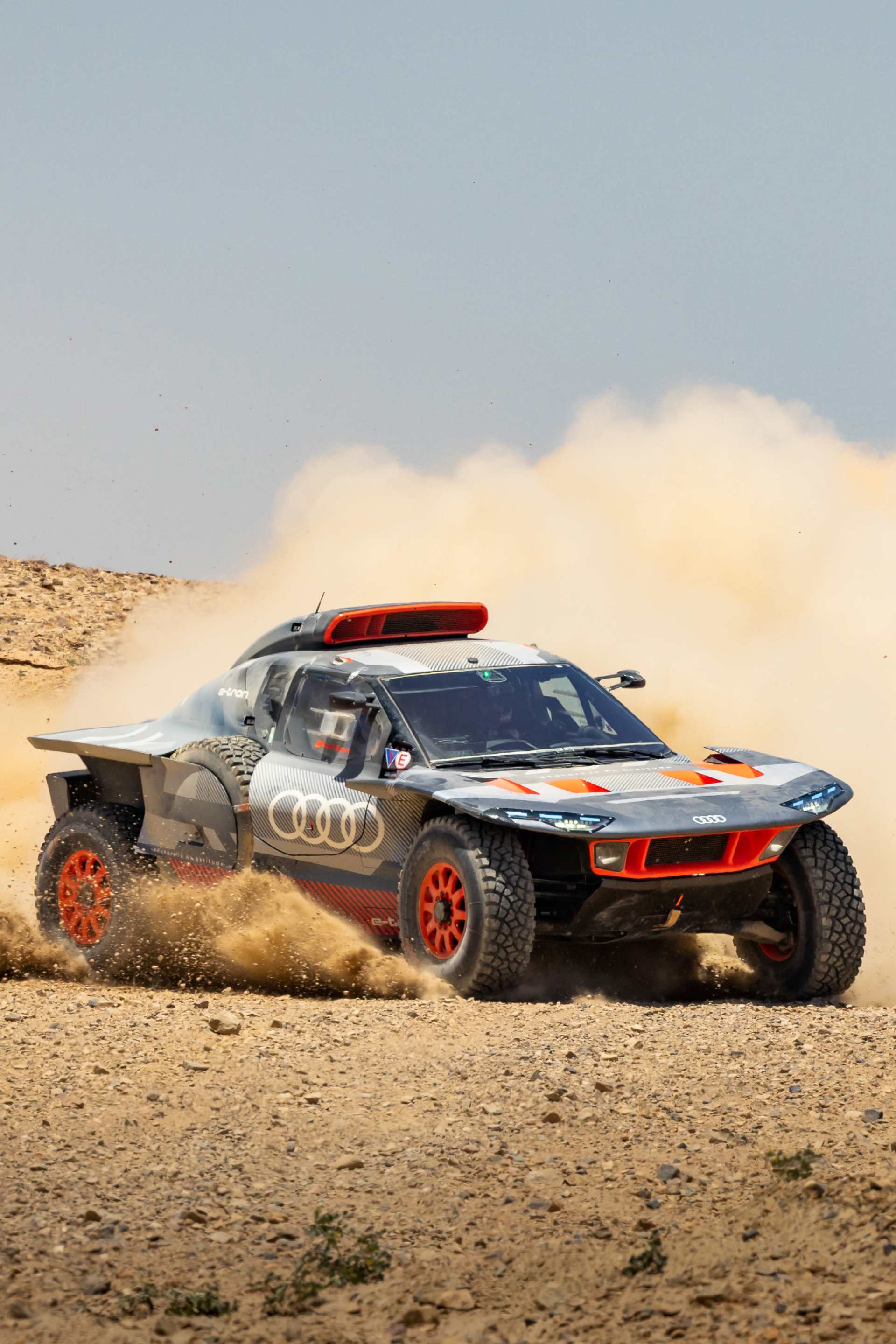 The Audi RS Q e-tron racing in the desert.